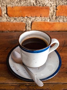 A cup of coffee on a table