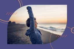 A woman with arthritis stretching on the beach